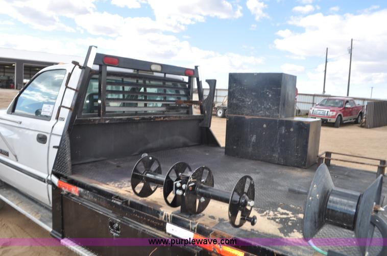 image for item F2353 1999 Dodge Ram 3500 Laramie SLT flatbed truck