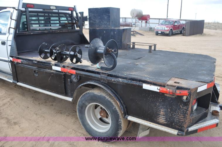 image for item F2353 1999 Dodge Ram 3500 Laramie SLT flatbed truck