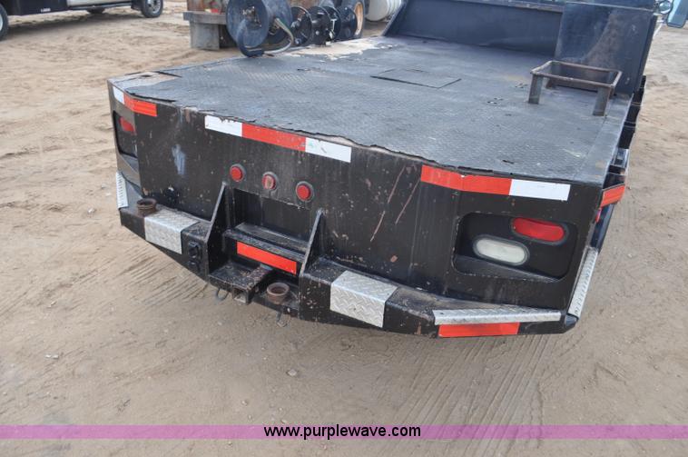 image for item F2353 1999 Dodge Ram 3500 Laramie SLT flatbed truck
