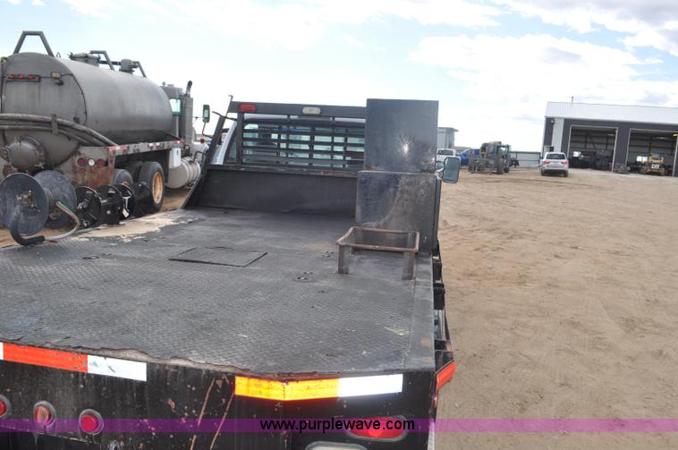 image for item F2353 1999 Dodge Ram 3500 Laramie SLT flatbed truck