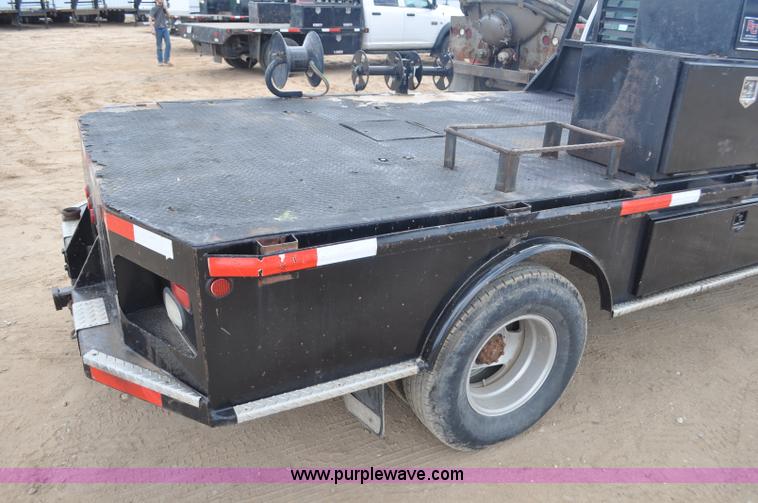 image for item F2353 1999 Dodge Ram 3500 Laramie SLT flatbed truck