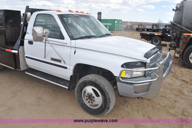 image for item F2353 1999 Dodge Ram 3500 Laramie SLT flatbed truck
