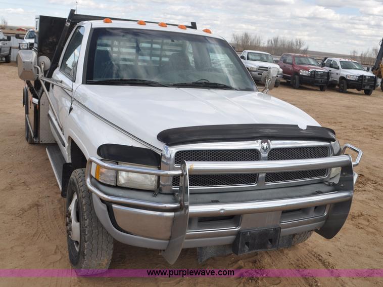 image for item F2353 1999 Dodge Ram 3500 Laramie SLT flatbed truck