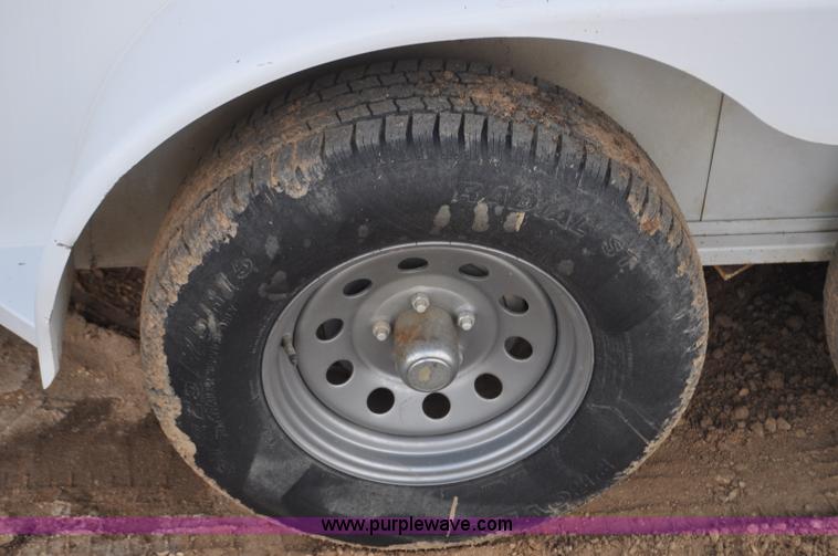 image for item F2361 2011 Titan enclosed trailer