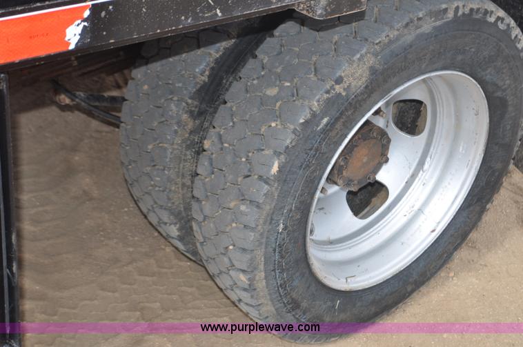 image for item F2364 2011 Dodge Ram 5500 HD Quad Cab flatbed truck