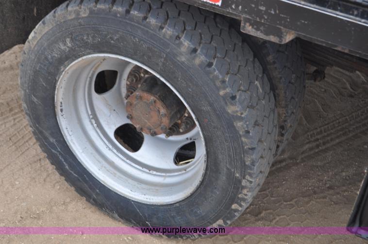 image for item F2364 2011 Dodge Ram 5500 HD Quad Cab flatbed truck