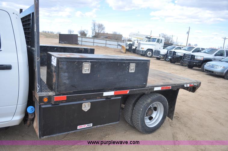 image for item F2364 2011 Dodge Ram 5500 HD Quad Cab flatbed truck