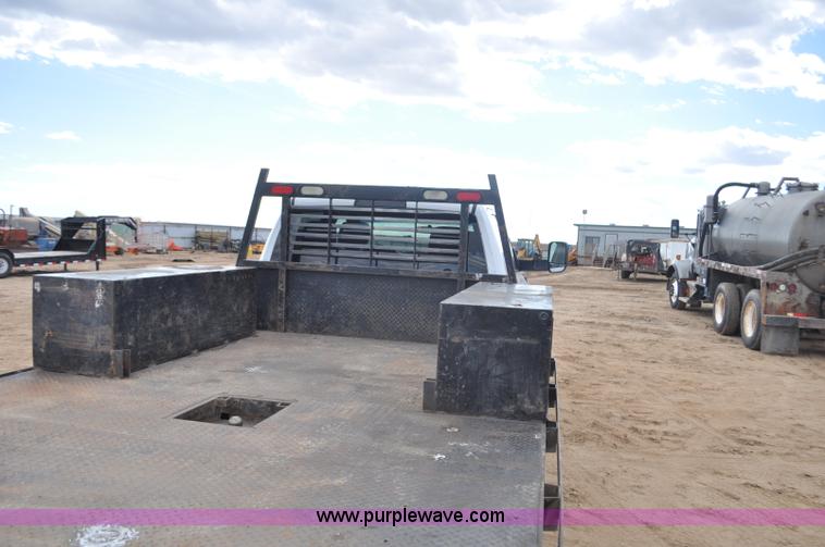 image for item F2364 2011 Dodge Ram 5500 HD Quad Cab flatbed truck