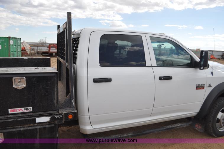 image for item F2364 2011 Dodge Ram 5500 HD Quad Cab flatbed truck
