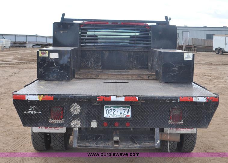 image for item F2365 2008 Dodge Ram 5500 HD Quad Cab flatbed truck