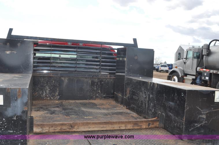 image for item F2365 2008 Dodge Ram 5500 HD Quad Cab flatbed truck