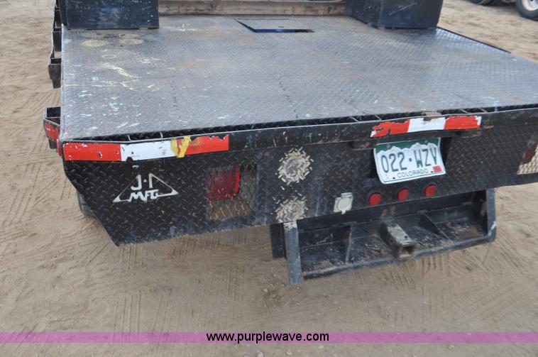image for item F2365 2008 Dodge Ram 5500 HD Quad Cab flatbed truck