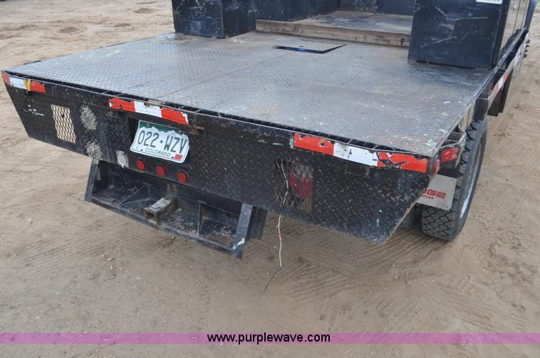image for item F2365 2008 Dodge Ram 5500 HD Quad Cab flatbed truck