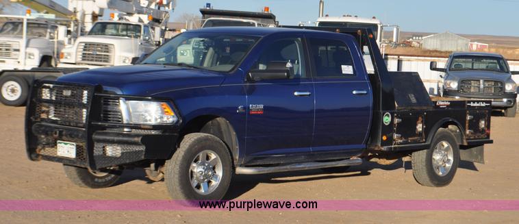 image for item F2375 2010 Dodge Ram 3500 Quad Cab flatbed truck