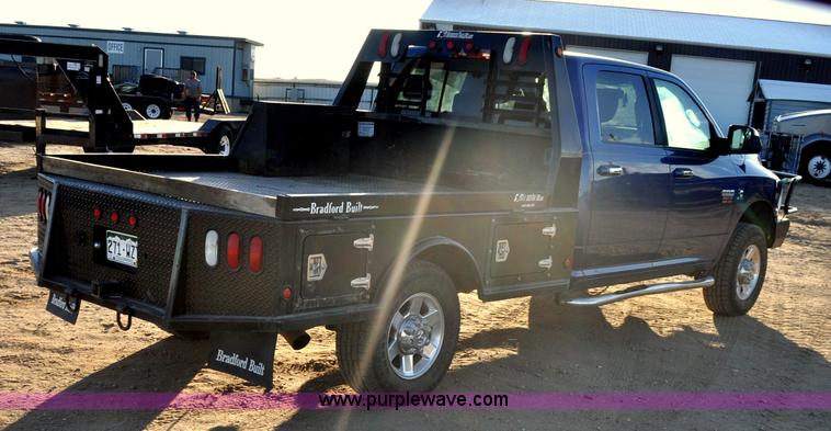 image for item F2375 2010 Dodge Ram 3500 Quad Cab flatbed truck