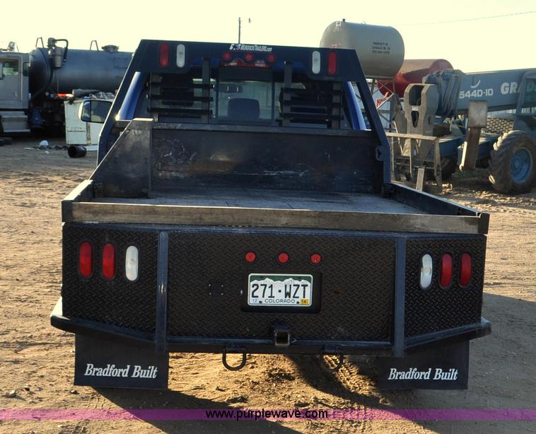 image for item F2375 2010 Dodge Ram 3500 Quad Cab flatbed truck