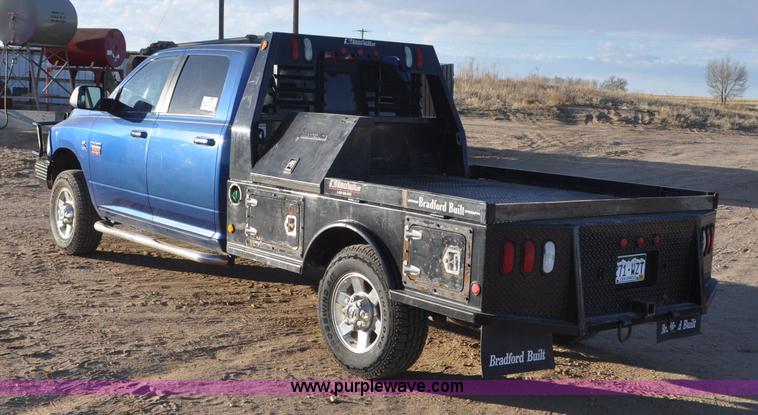 image for item F2375 2010 Dodge Ram 3500 Quad Cab flatbed truck
