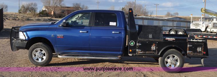 image for item F2375 2010 Dodge Ram 3500 Quad Cab flatbed truck