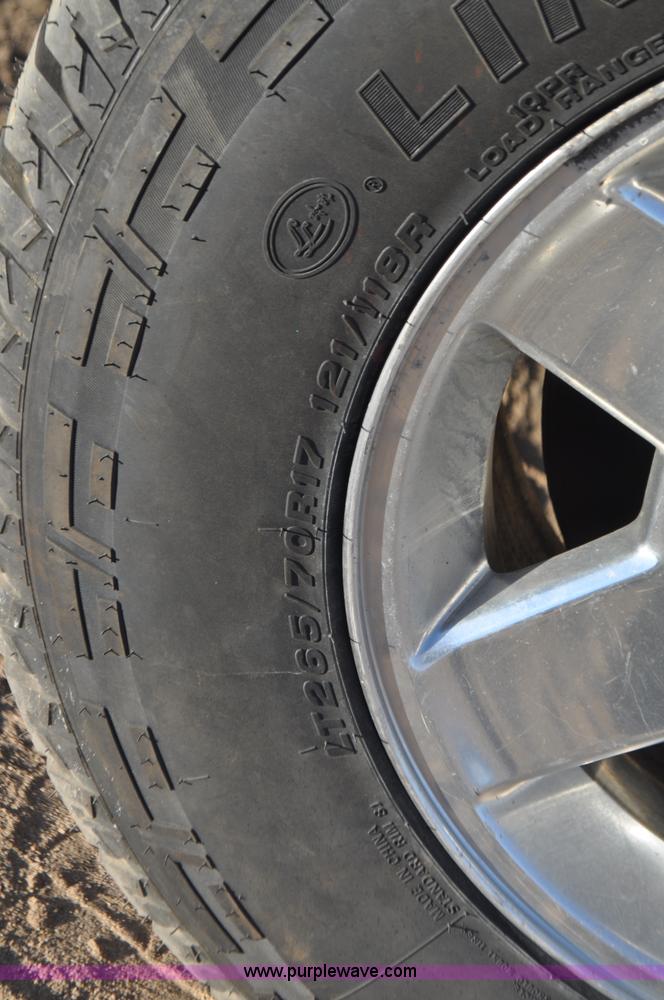 image for item F2375 2010 Dodge Ram 3500 Quad Cab flatbed truck