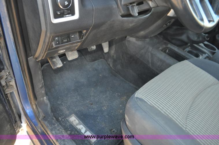 image for item F2375 2010 Dodge Ram 3500 Quad Cab flatbed truck