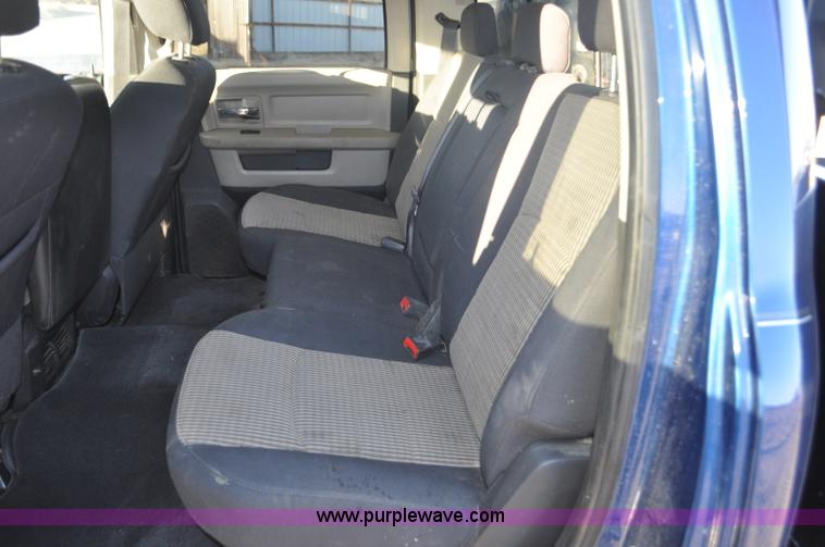 image for item F2375 2010 Dodge Ram 3500 Quad Cab flatbed truck