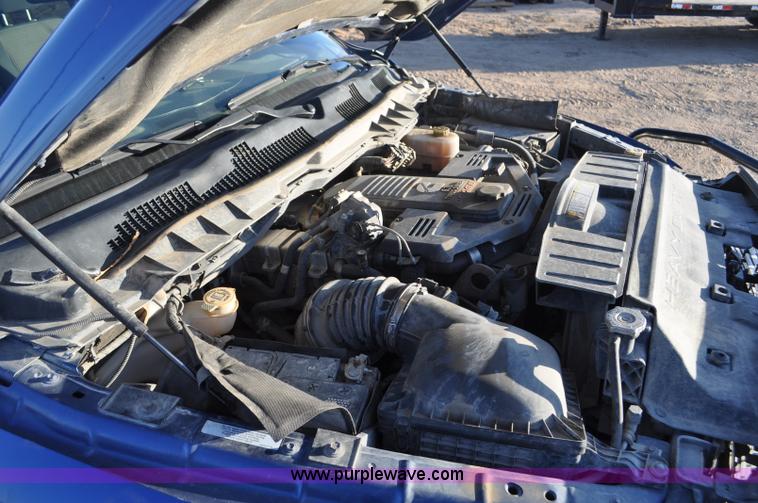 image for item F2375 2010 Dodge Ram 3500 Quad Cab flatbed truck