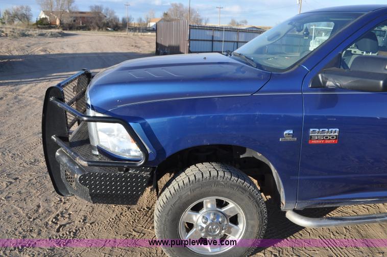 image for item F2375 2010 Dodge Ram 3500 Quad Cab flatbed truck