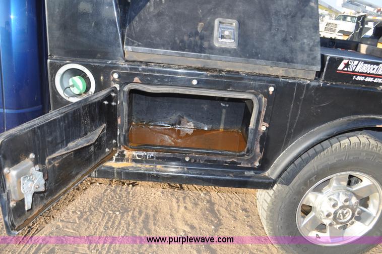 image for item F2375 2010 Dodge Ram 3500 Quad Cab flatbed truck