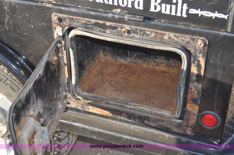 image for item F2375 2010 Dodge Ram 3500 Quad Cab flatbed truck