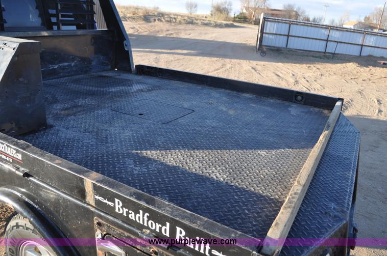 image for item F2375 2010 Dodge Ram 3500 Quad Cab flatbed truck