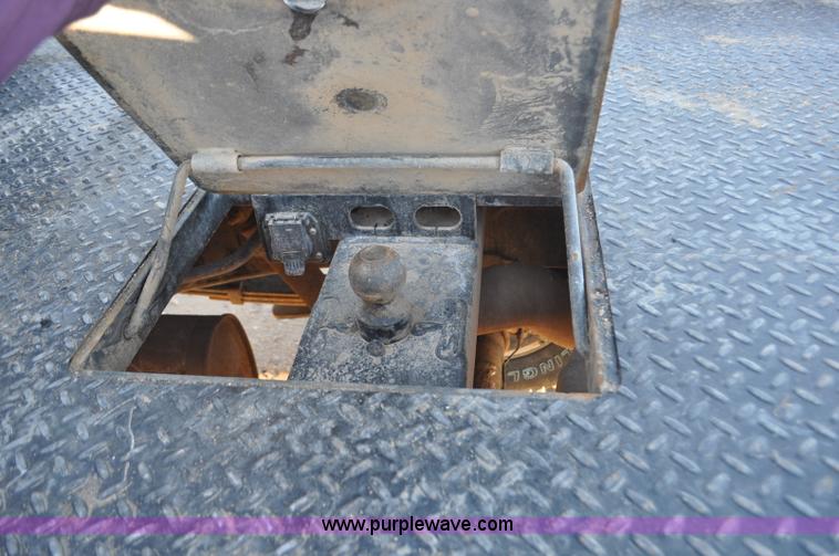 image for item F2375 2010 Dodge Ram 3500 Quad Cab flatbed truck