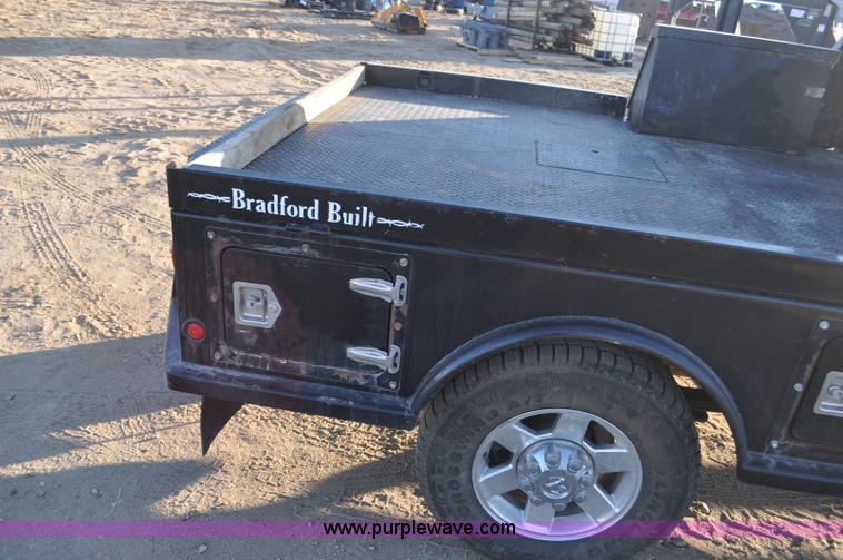 image for item F2375 2010 Dodge Ram 3500 Quad Cab flatbed truck