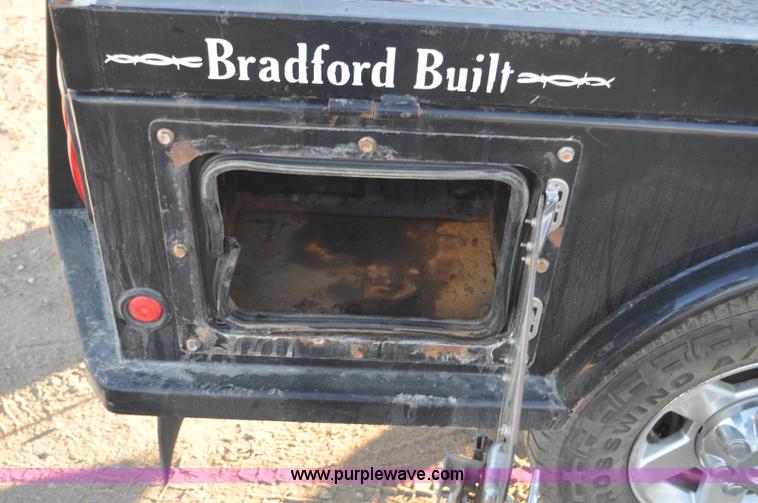 image for item F2375 2010 Dodge Ram 3500 Quad Cab flatbed truck