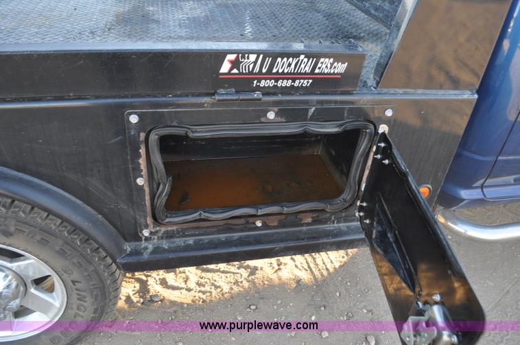 image for item F2375 2010 Dodge Ram 3500 Quad Cab flatbed truck