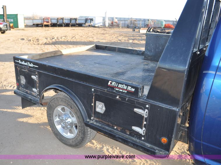image for item F2375 2010 Dodge Ram 3500 Quad Cab flatbed truck
