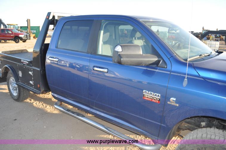 image for item F2375 2010 Dodge Ram 3500 Quad Cab flatbed truck