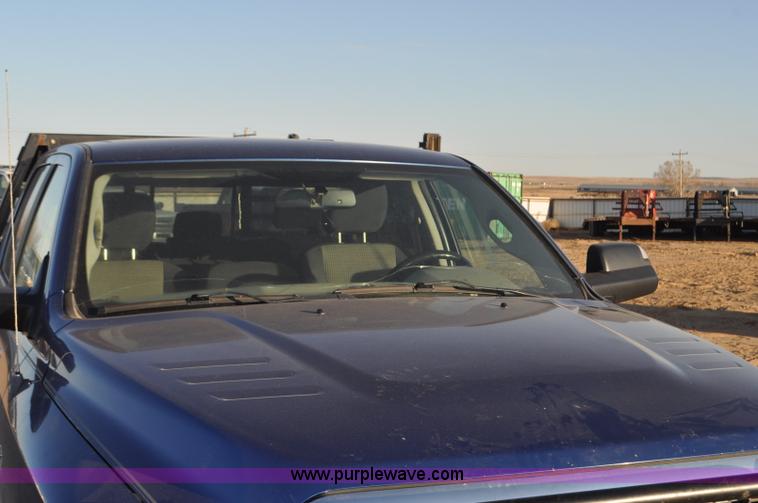 image for item F2375 2010 Dodge Ram 3500 Quad Cab flatbed truck