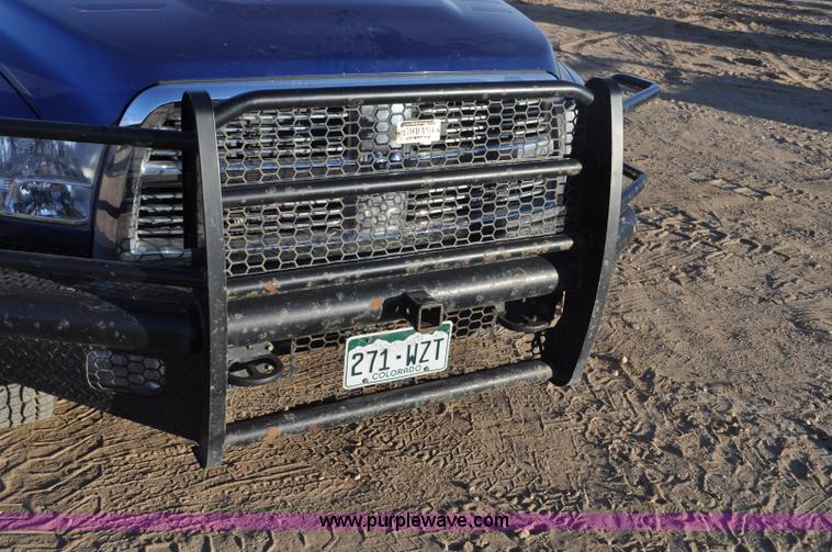 image for item F2375 2010 Dodge Ram 3500 Quad Cab flatbed truck