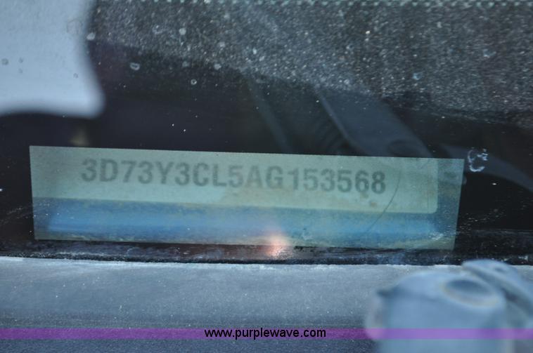 image for item F2375 2010 Dodge Ram 3500 Quad Cab flatbed truck