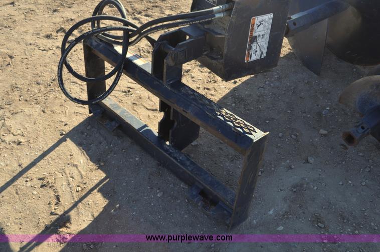 image for item F2394 Lowe 650CLH skid skid steer auger