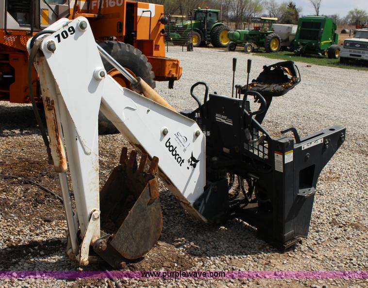 Bobcat 709 skid steer backhoe attachment in Winfield, KS Item F7643
