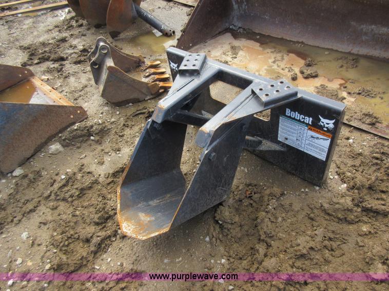 image for item F8471 Bobcat digger skid steer attachment