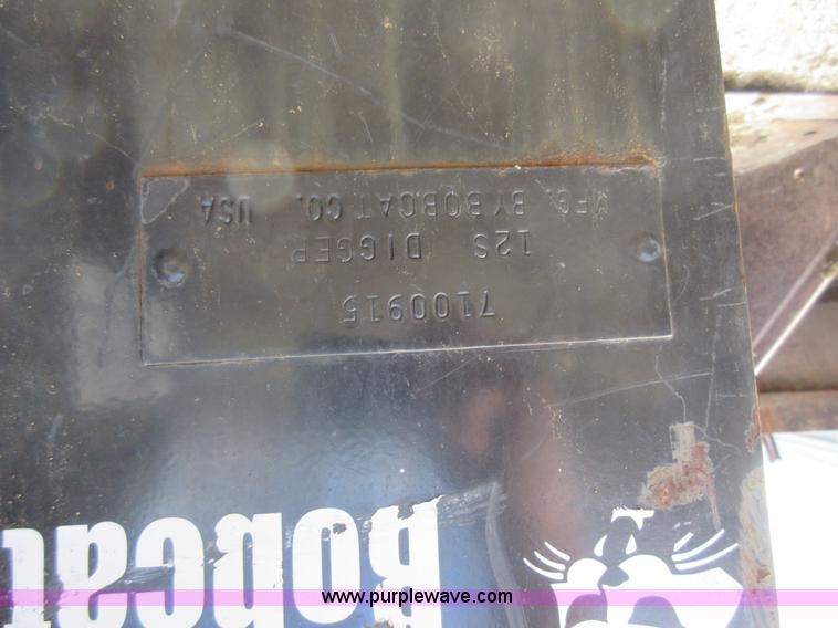 image for item F8471 Bobcat digger skid steer attachment