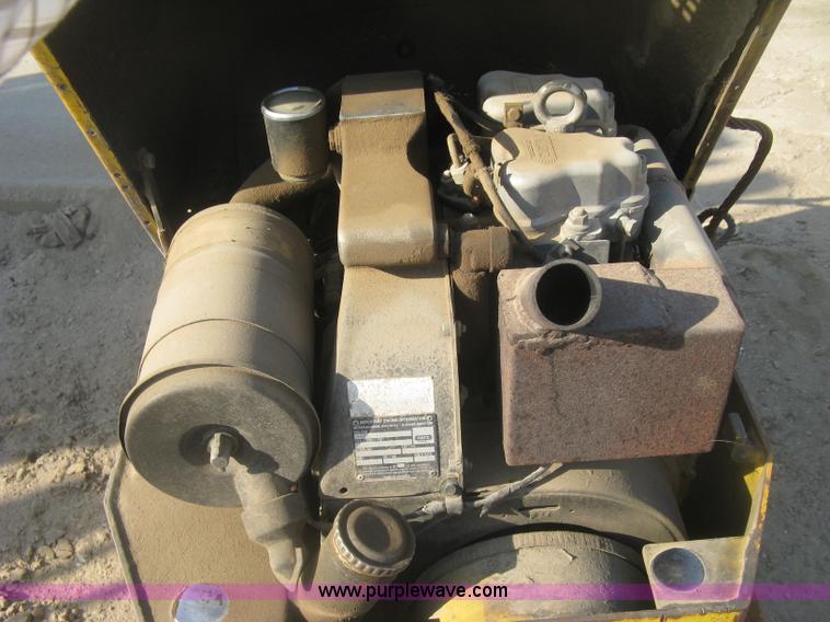 image for item H8720 1996 Multiquip Rammax RW1404-MR trench compactor