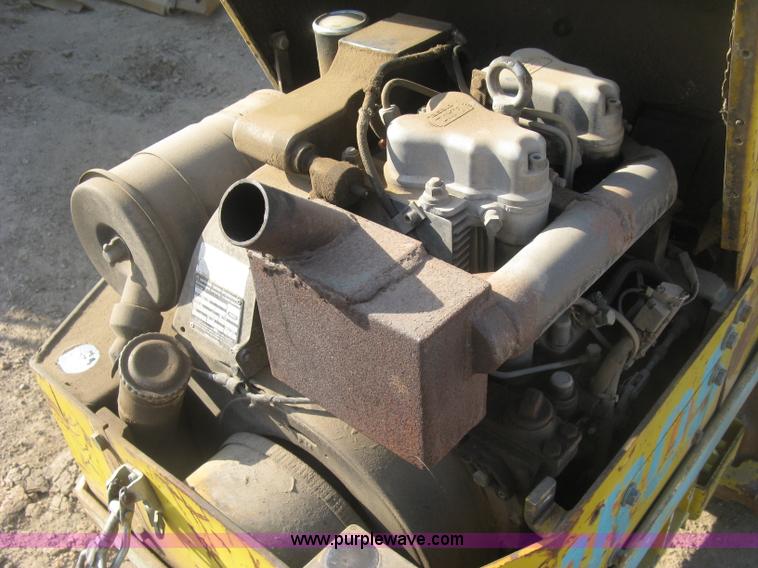 image for item H8720 1996 Multiquip Rammax RW1404-MR trench compactor