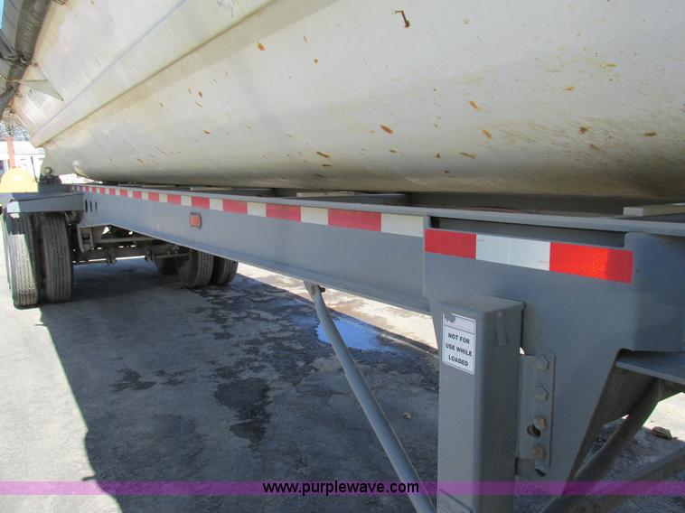 image for item K5003 2002 Smith side dump trailer