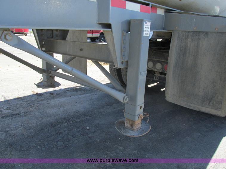 image for item K5003 2002 Smith side dump trailer