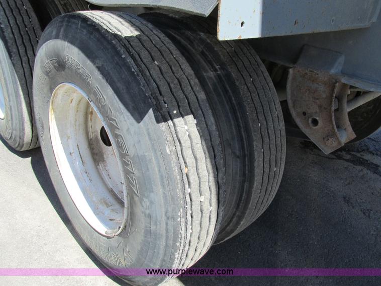 image for item K5003 2002 Smith side dump trailer