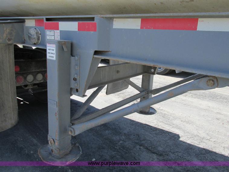 image for item K5003 2002 Smith side dump trailer