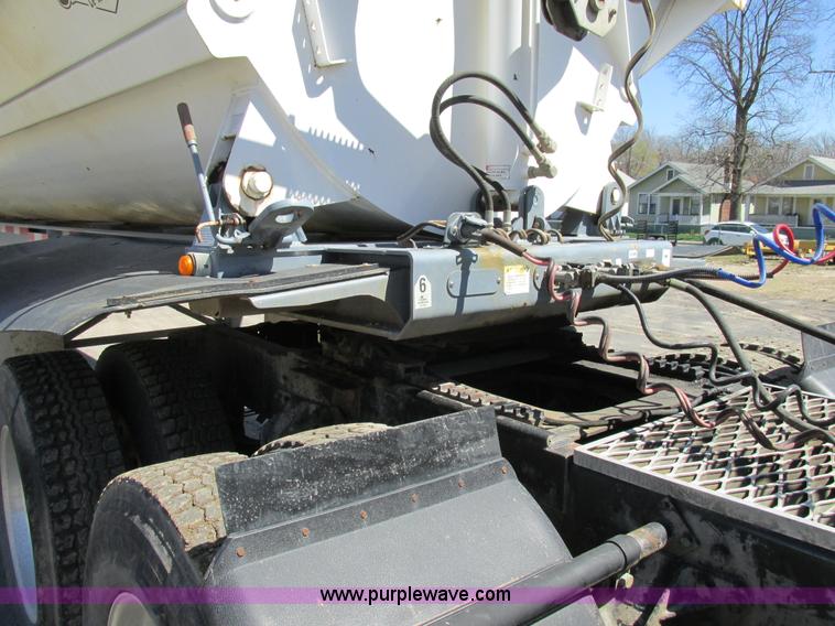 image for item K5005 2002 Smith side dump trailer